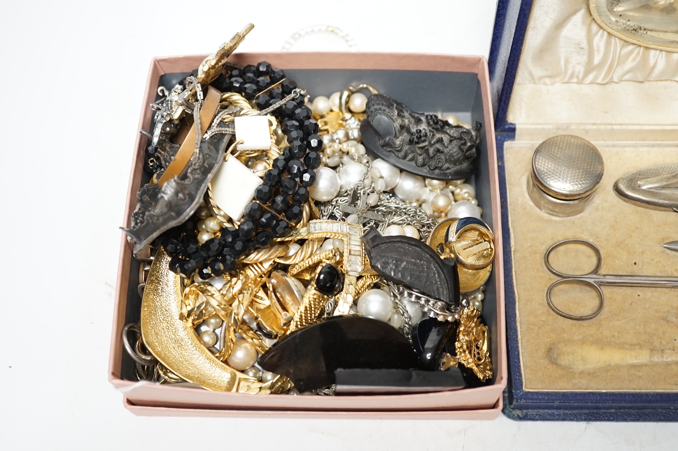 A collection of Victorian and later costume jewellery and a cased silver mounted vanity set. Condition - poor to fair to good